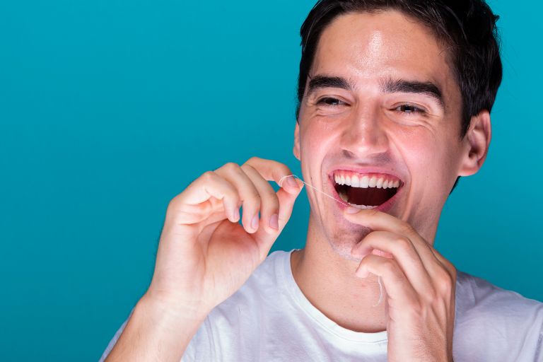 how to floss teeth